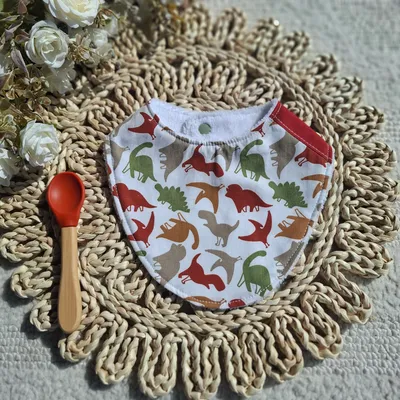 bavoir 0-9 mois motif dinosaures